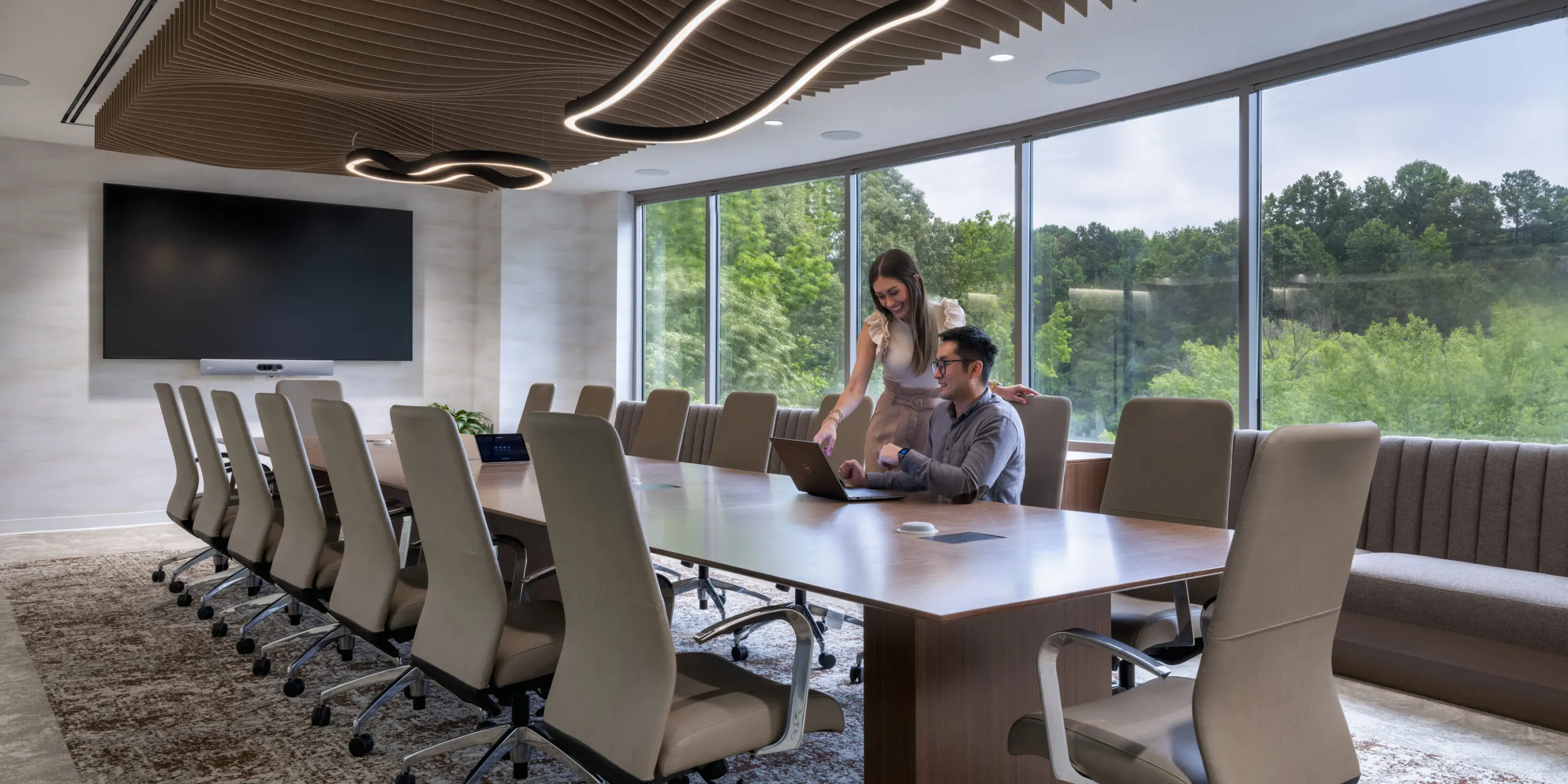 Sompo Atlanta conference room with sculptural wood ceiling and integrated lighting