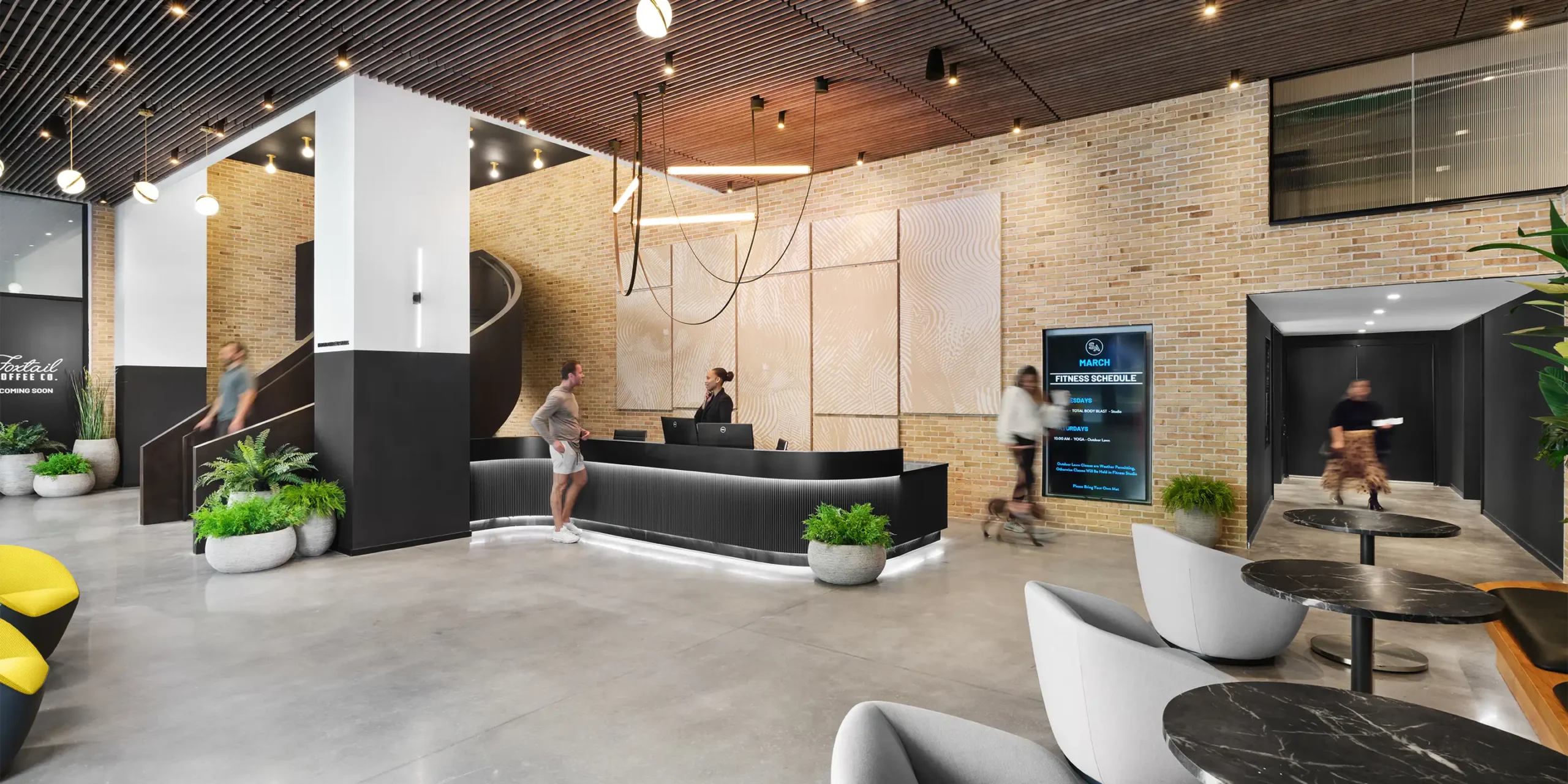 Society Atlanta lobby with sculptural black metal staircase