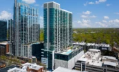 Bird’s-eye view of Society Atlanta showing amenity and parking decks among Midtown buildings