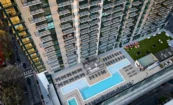 Rooftop pool and turf deck atop Society Atlanta’s amenity level
