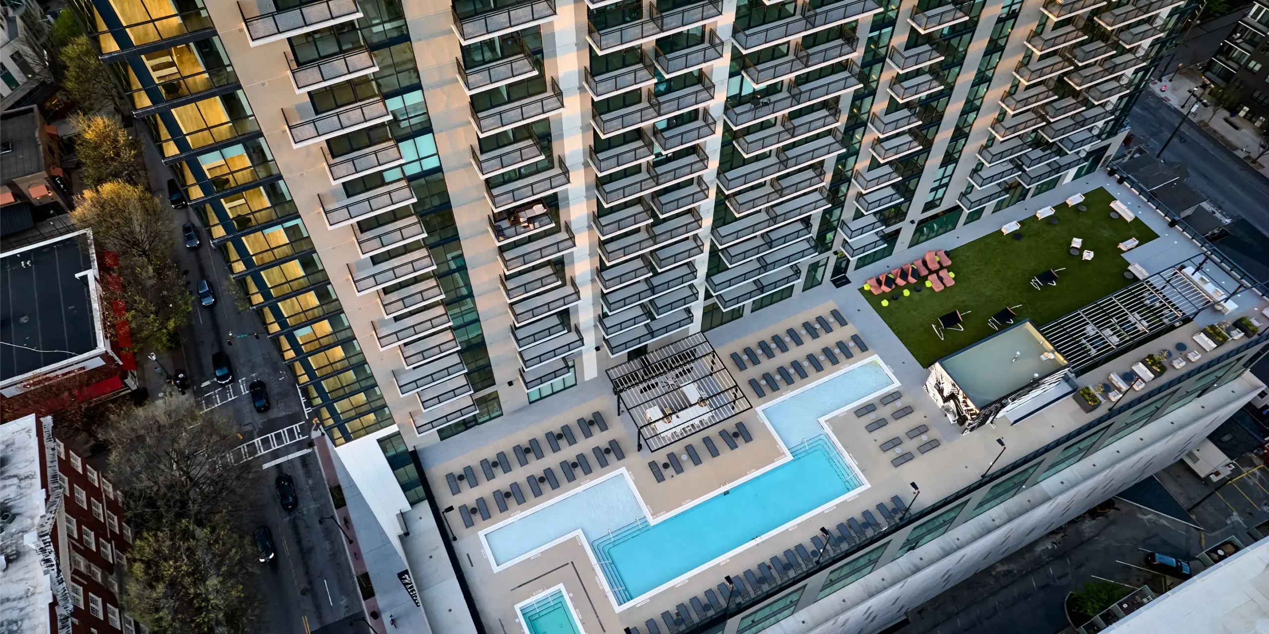 Rooftop pool and turf deck atop Society Atlanta’s amenity level