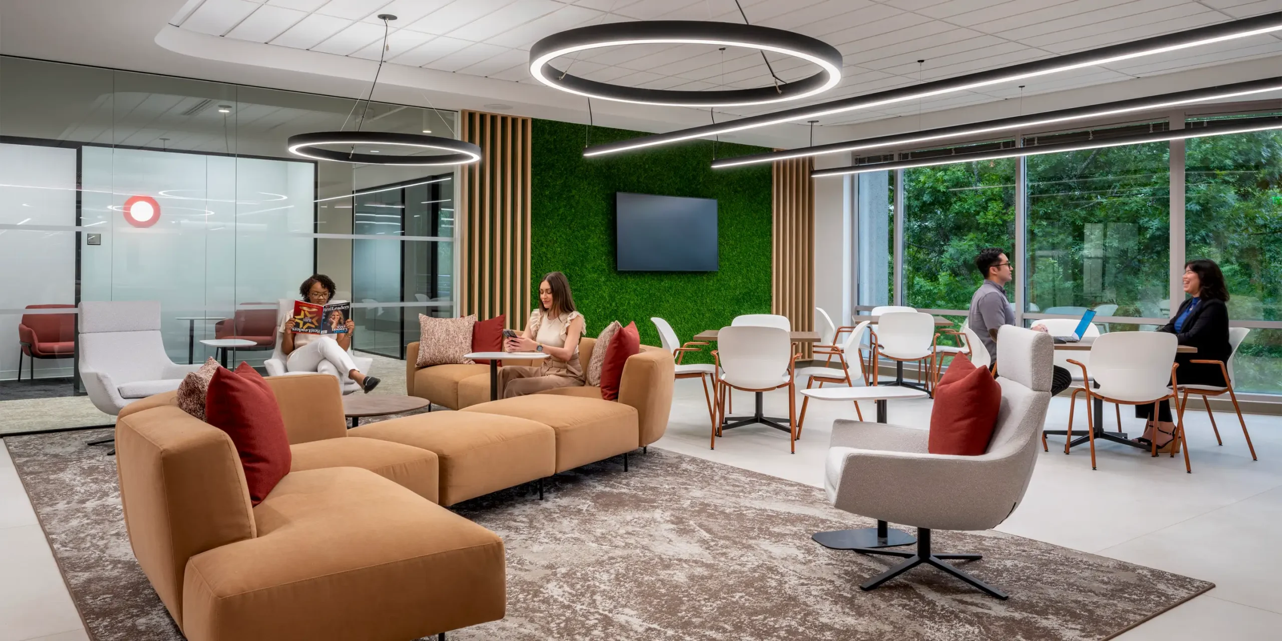 Open collaboration space with casual seating and natural light in Sompo’s office