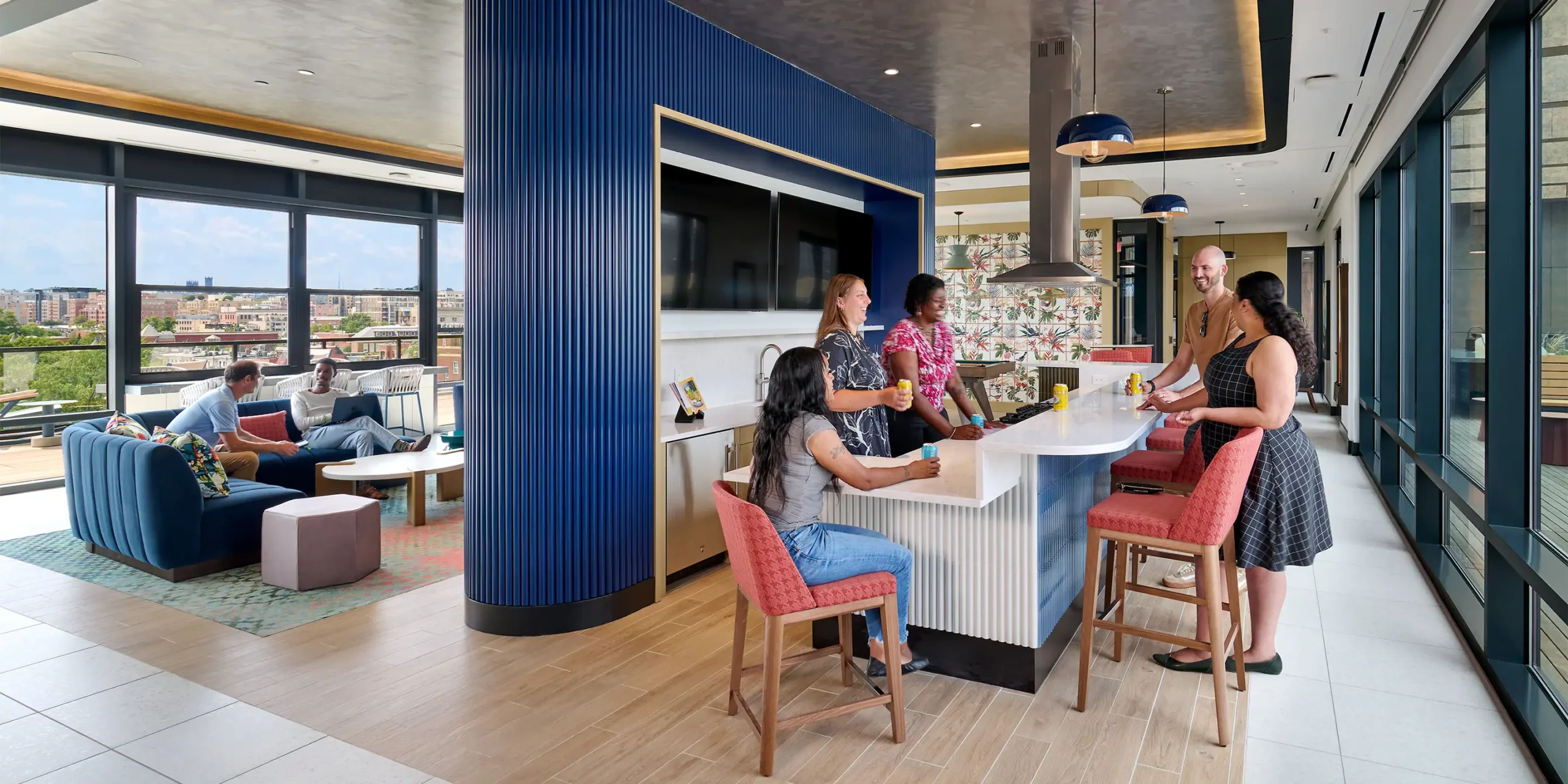 The Langston on Seventh mixed-use area with wet bar and seating.