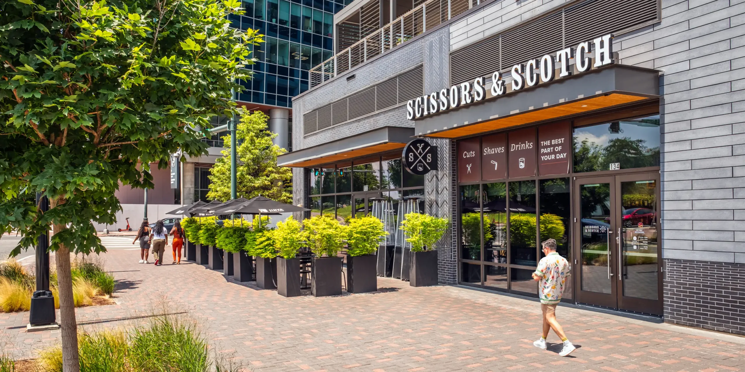 Scissors and Scotch exterior sign at the Ally Charlotte