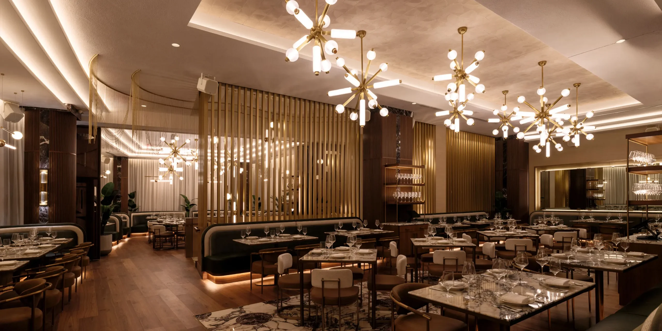 Main dining room with expo kitchen at 1587 Prime Kansas City steakhouse.