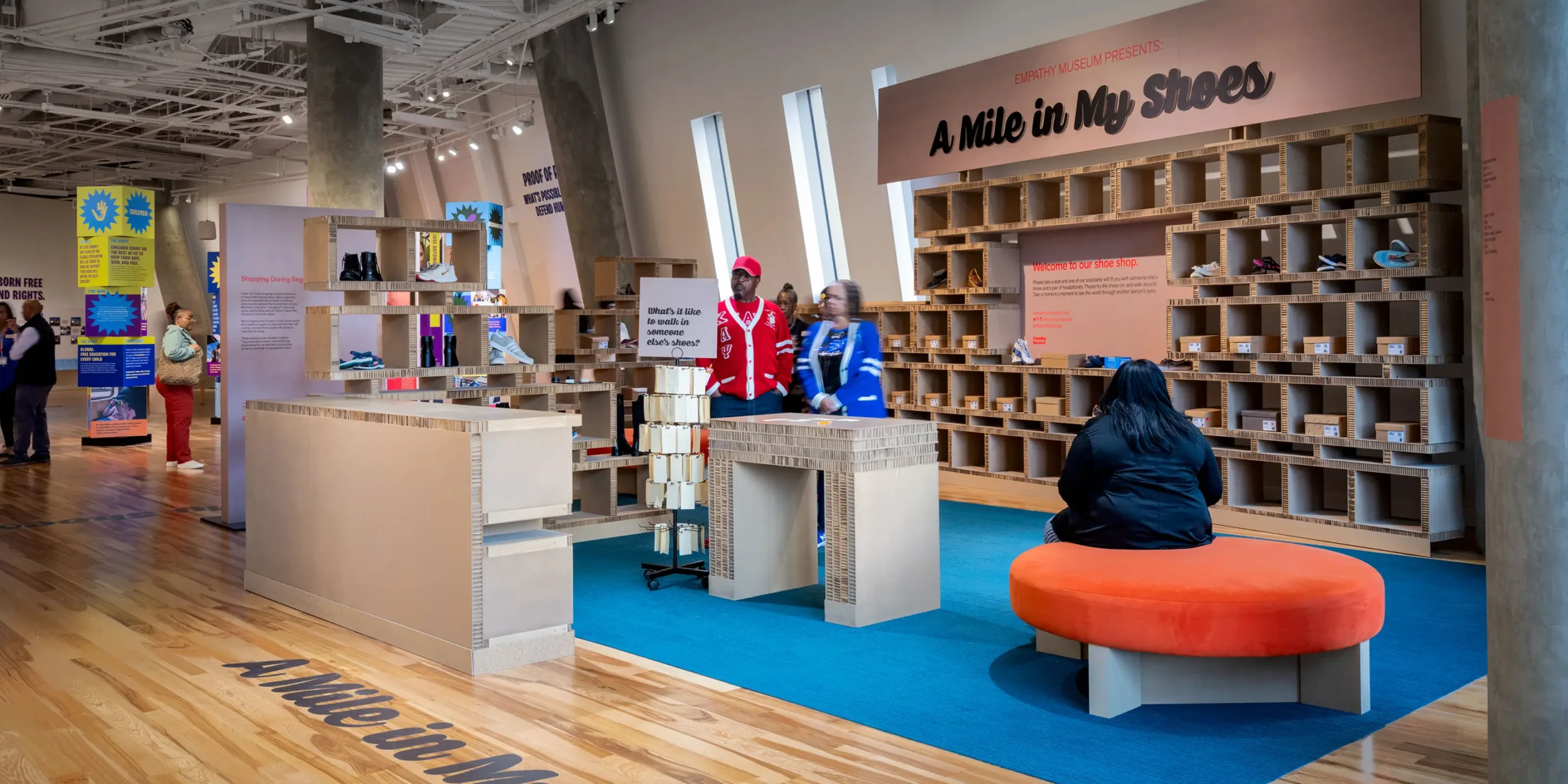 Traveling Exhibit Integration: A Mile in My Shoes, an immersive shoe shop–themed installation where visitors hear individuals' personal stories.