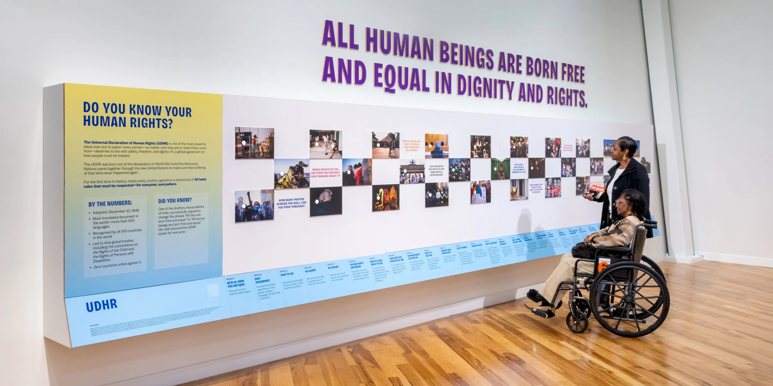 Universal Declaration of Human Rights Discovery Wall: A tactile installation where visitors peer through peepholes to discover the universal human rights outlined in the UDHR.