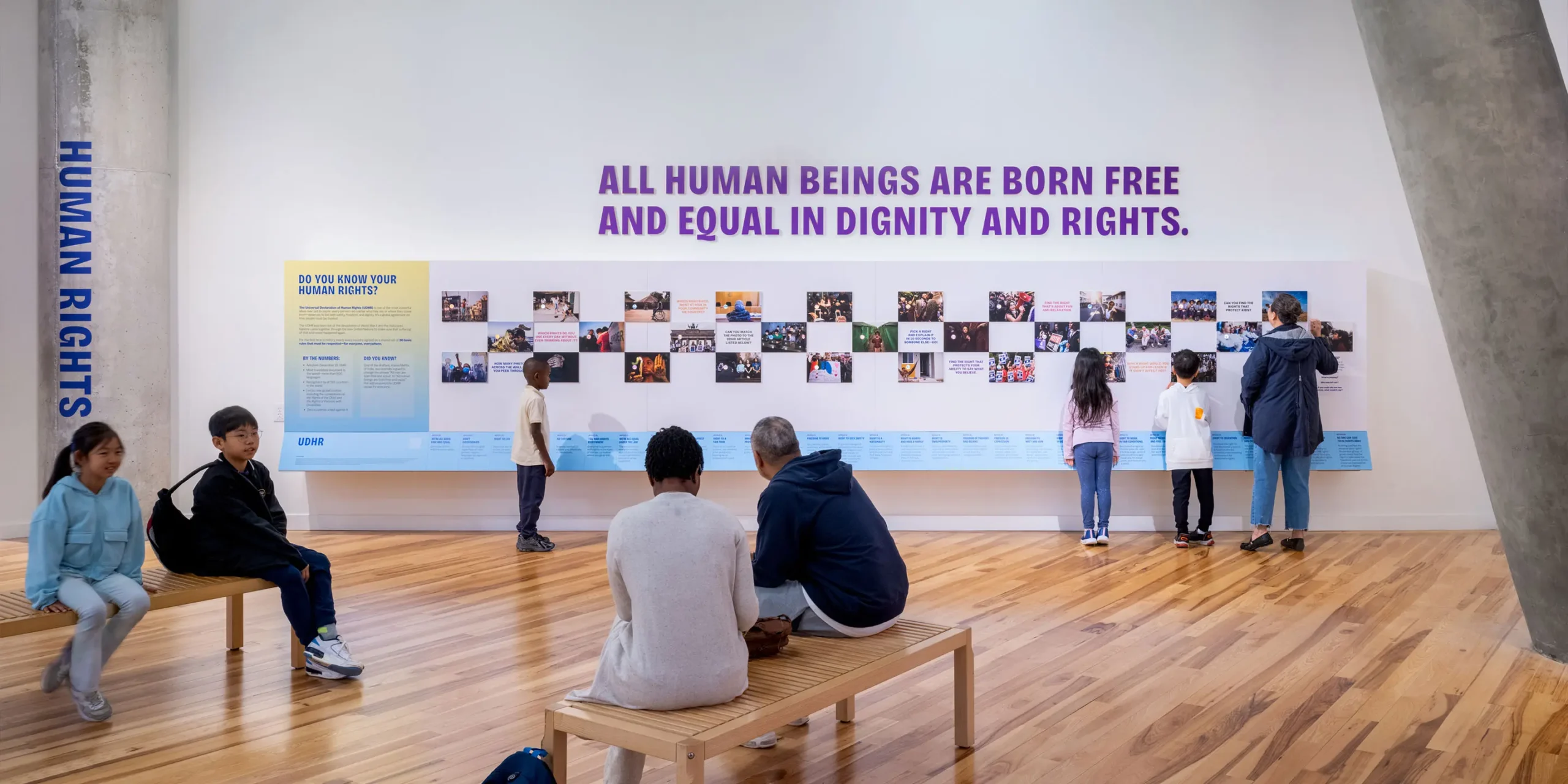 Universal Declaration of Human Rights Discovery Wall: A tactile installation where visitors peer through peepholes to discover the universal human rights outlined in the UDHR.