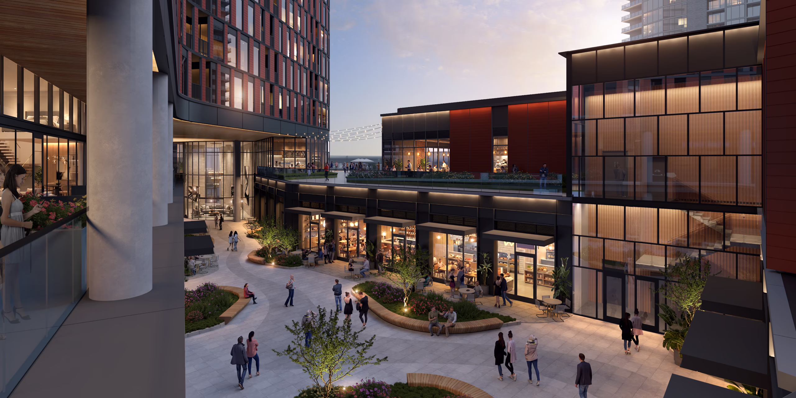 Evening rendering of the Centennial Yards courtyard in Atlanta viewed from a residential unit balcony, overlooking retail storefronts and outdoor seating areas